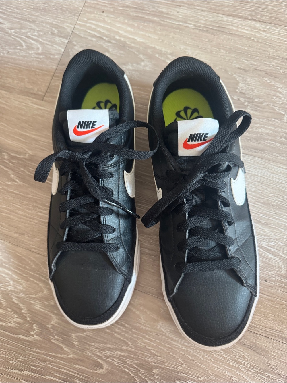 Nike court legacy Black and White Low-Top Sneakers with Orange Swoosh Accent